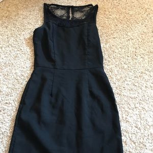 Black tight dress by Deb